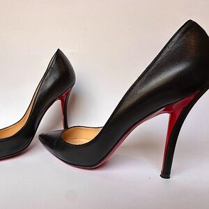 Christian Louboutin
Apostrophy Leather Pointed Red-Sole Pumps